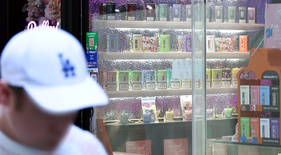 Liquid-based e-cigarettes are seen inside a shop in Seoul on April 24, the same day that a revision to the Tobacco Business Act went into effect. [YONHAP]