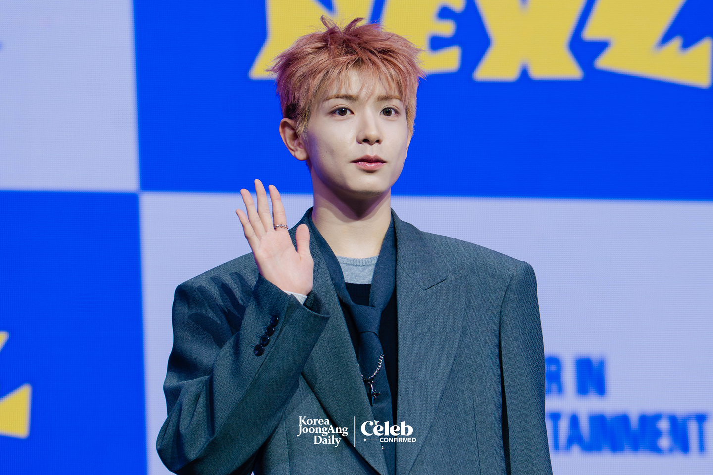 NEXZ’s Yuki poses for photos during a showcase for the release of the group’s second single “Mmchk” at Blue Square in central Seoul on April 27. [DANIELA GONZALEZ PEREZ]