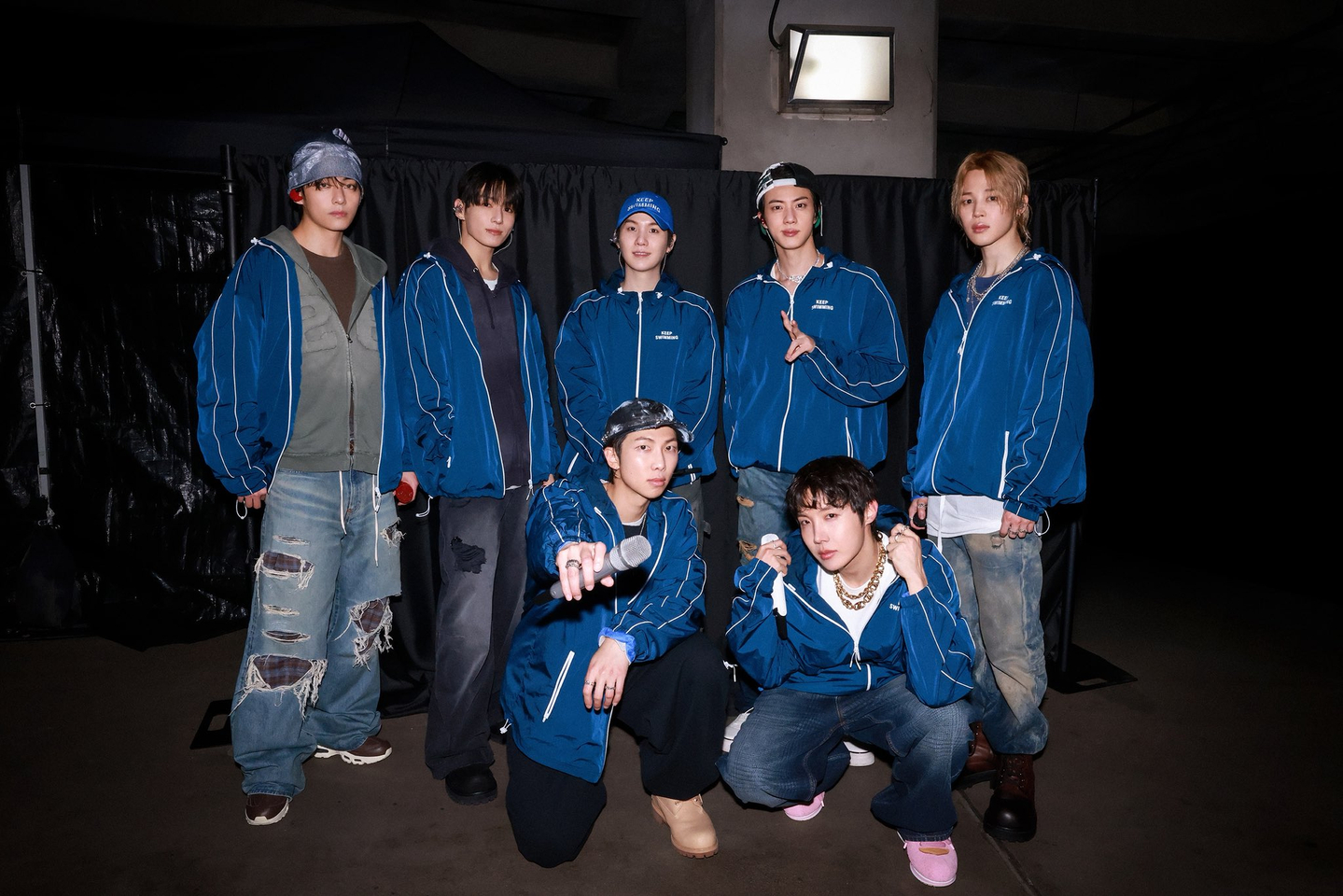 Members of boy band BTS pose for photos at the band's "Arirang" world tour concert held in Goyang, Gyeonggi, on April 9, 2026. [BIGHIT MUSIC]