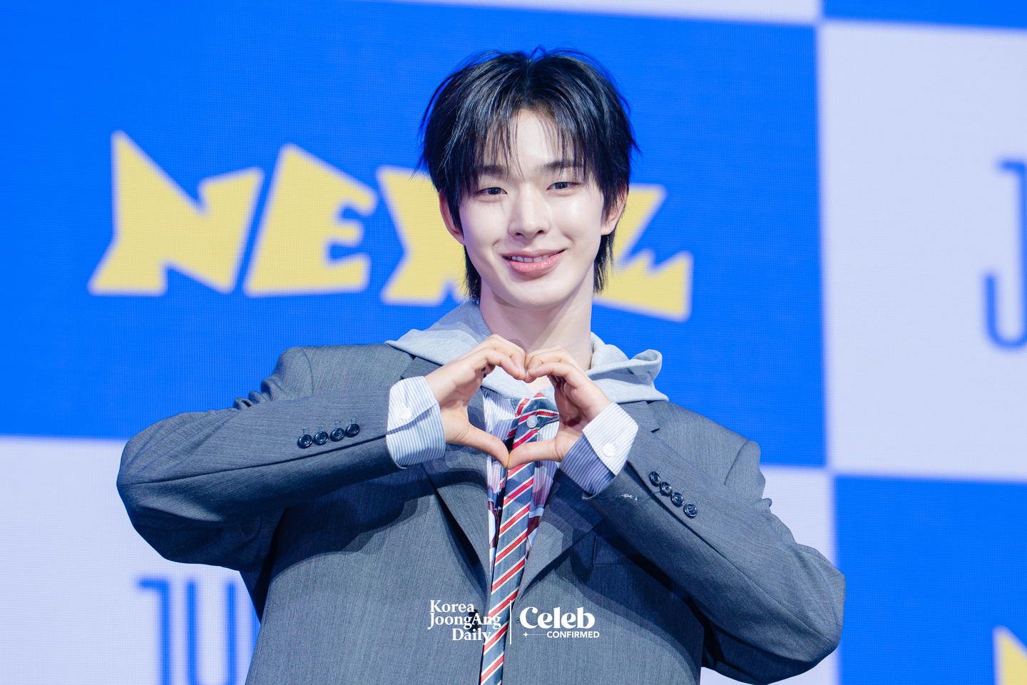 NEXZ’s Tomoya poses for photos during a showcase for the release of the group’s second single “Mmchk” at Blue Square in central Seoul on April 27. [DANIELA GONZALEZ PEREZ]