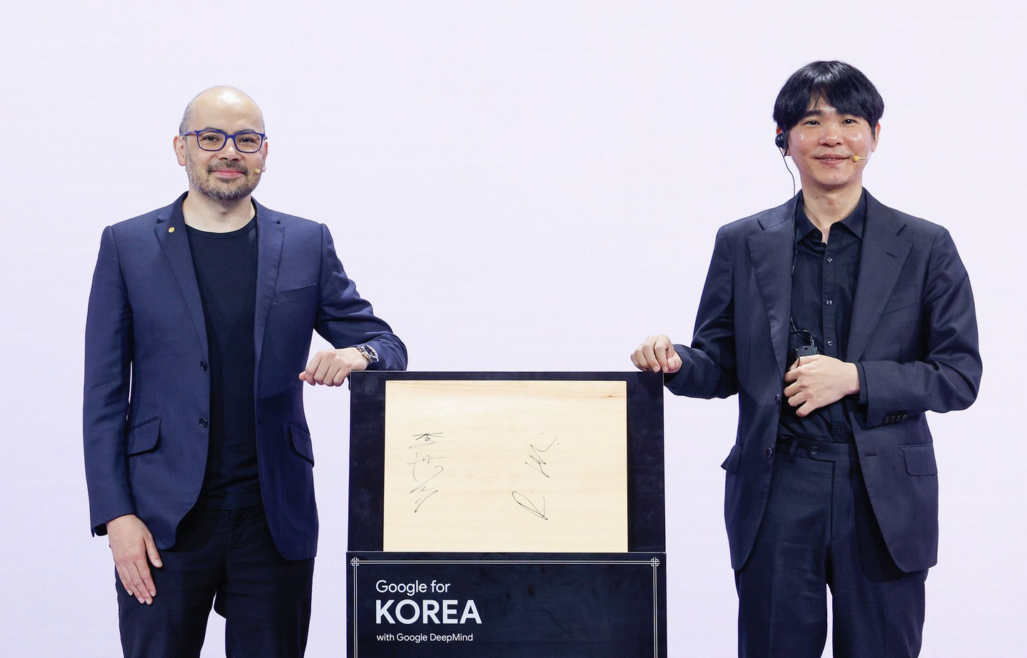 Demis Hassabis, the co-founder and CEO of Google DeepMind, left, poses with legendary Korean Go player Lee Se-dol at an event held at the Westin Josun Seoul hotel in Jung District, central Seoul, on April 29. Hassabis met with Lee 10 years after the Go player played against AlphaGo AI in 2016. [NEWS1]