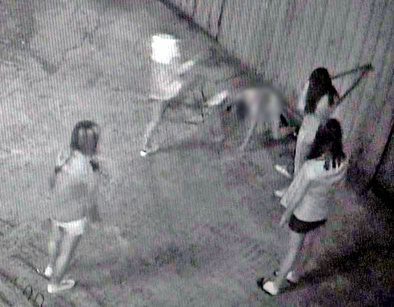 A security camera footage shows four middle school students beating a 14-year-old in front of a factory in Sasang District, Busan, in September 2017. [YONHAP]