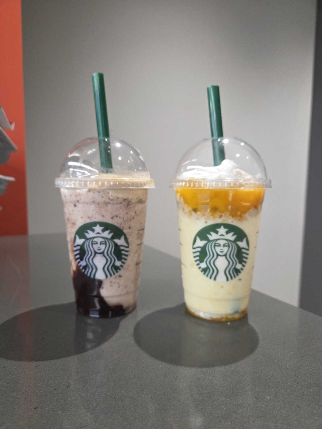 Starbucks new bingsu (shaved ice) options. The red bean bingsu, left, and mango bingsu [STARBUCKS]