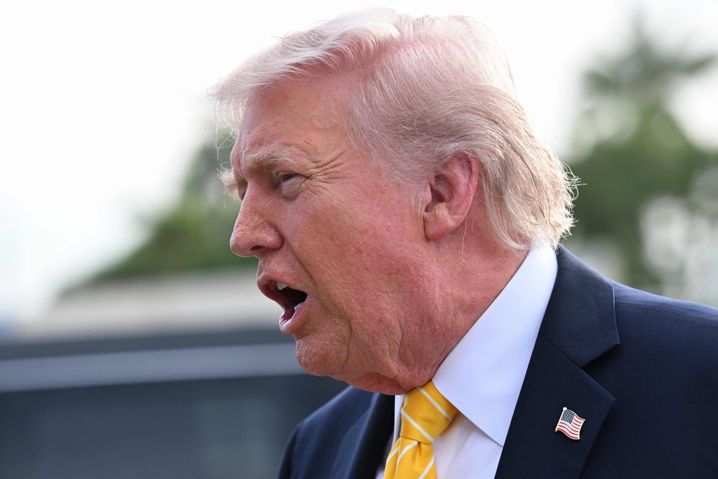 President Donald Trump speaks to journalists before boarding Air Force One at Palm Beach International Airport on May 2 in Palm Beach, Florida. [GETTY IMAGES/YONHAP]